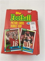 36 unopened packs of 1990 Topps football cards