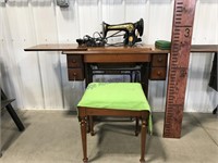 Singer elect sewing machine in cabinet w/seat