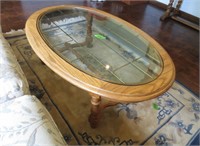 Oval glasstop coffee table