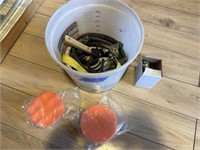 bucket of bungee cords, buffing pads & light bulb