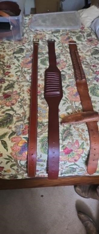 Two leather ammo belts one regular belt