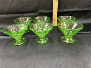 6 Vaseline glass dessert dishes, 1 has a small