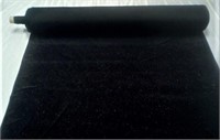 Roll of Black fabric with multicolored sparkles