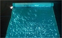 Roll of Teal sequin fabric