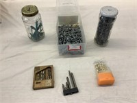 assorted nails, drill bits and screws