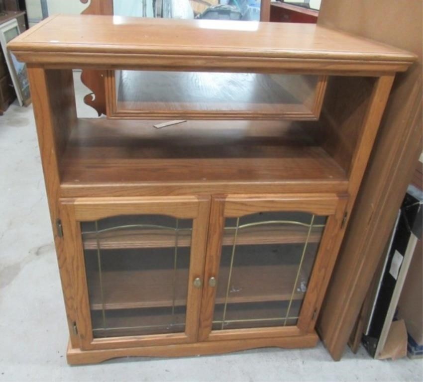 Oak entertainment center. Measures: 44" H x 38" W