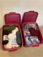 2 red totes of yarn.