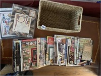 BASKET OF CROSS STICH MAGAZINES, CROSS STITCH