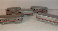 D4) 5 Midgetoy vintage metal train car toys.