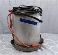Heated water container for chickens