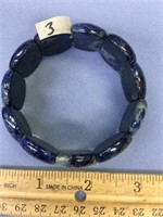 Cabochon cut lapis sectional bracelet           (g