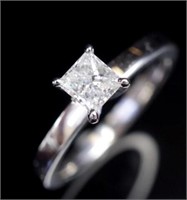 Princess cut diamond and 18ct white gold ring