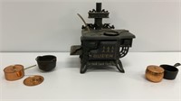 Vintage mini cast iron ‘queen’ stove with pots