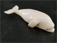 Ivory beluga whale, was once a part of a larger pi