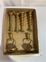 Flat of brass candlesticks