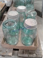 Assorted blue glass jars