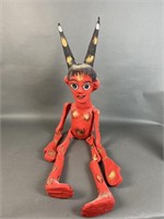 Folk art paper mache devil.