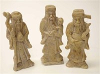 Three Chinese carved stone Immortal figures