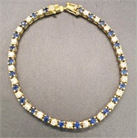 (XX) Goldtone Sterling Silver Blue Sapphire and