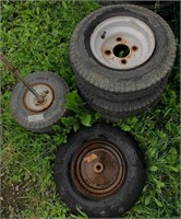 Lot of 9 trailer wheels and tires. 5.70-8x3, 4.80-