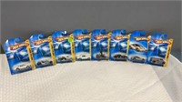 8 miscellaneous hot wheels new on cards.