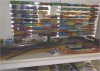 HO railroad items on bench and shelving