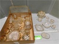 Wide assortment of gold trimmed glass dishes; some