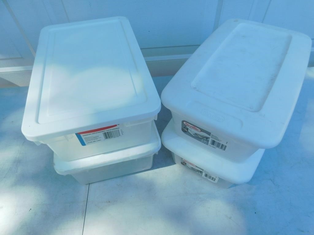 Four 1.5 gal storage containers