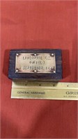 Wooden block with metal plate that says Liverpool