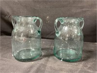 2 clear glass flower vases