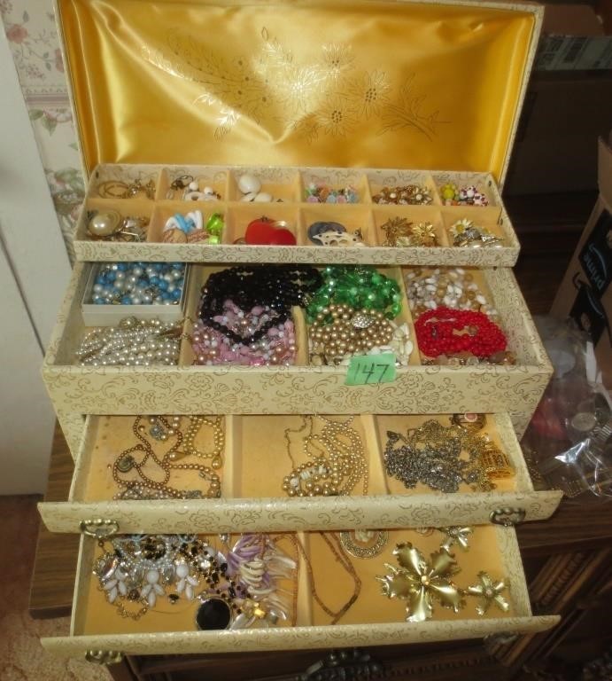 Costume jewelry in cabinet