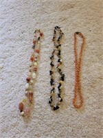 Three assorted women's necklaces