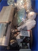 Bin of hammered aluminum pots and pans