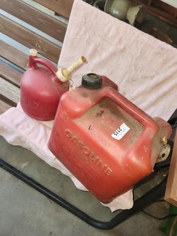 2 Gas Cans - 5 gallon can is full, small one is