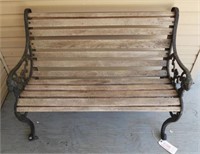 Wrought iron Park style bench with figural