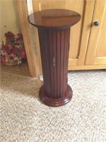 Mahogany stained stand with door 25 in tall