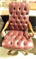 Lot #704 - Executive style maroon tufted seat