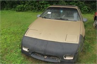 1986 GOLD FIERO WITH TITLE, NOT RUNNING