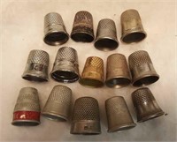 19 thimbles, one is Sterling one Mark England