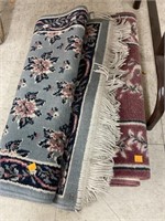2 throw rugs. Approx 24in W
