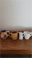 Small ceramic pitchers