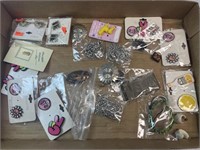 Several pieces of assorted costume jewelry
