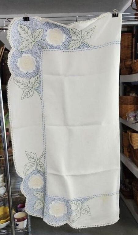 Embroidered Table Cloth Pictured in half