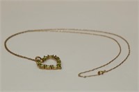 14k Peridot Heart Necklace, 2.4 grams total weight