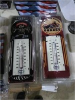2 modern thermometers.