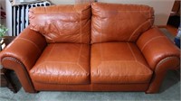 Solid Orange Leather Love Seat-Quality, Good Cond.