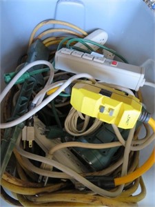 tote of extension cords, power strips