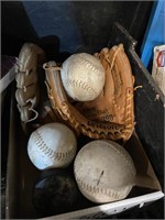 baseballs and George Brett MVP 390 Wilson glove
