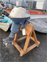 Evenrude 9.5 HP boat motor on stand