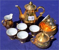 Gold coloured tea set  made in St. Kilda Australia